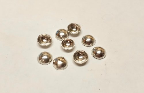 Judy Larson's Domed Stud with Drop Loop - , Metalwork, Cutting, Cutting Tool, Cutters, How To Punch Holes, Hole Punching, Punch A Hole, Stamping, Stamps, Butane Torch, Soldering, Solder, Repeat the process with all the discs.